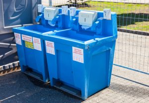 two hand washing stations on a concrete slab